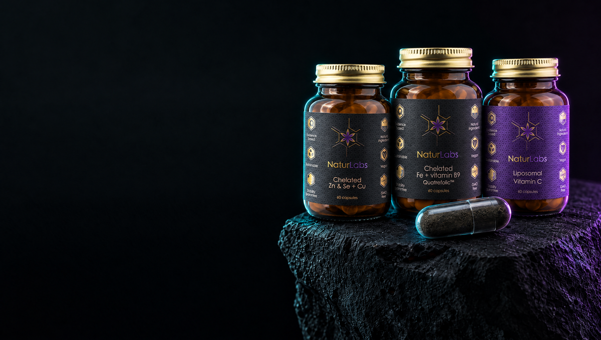 Three Naturlabs jars and capsules on dark stone